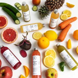 6 bottles of detox drinks with fruits